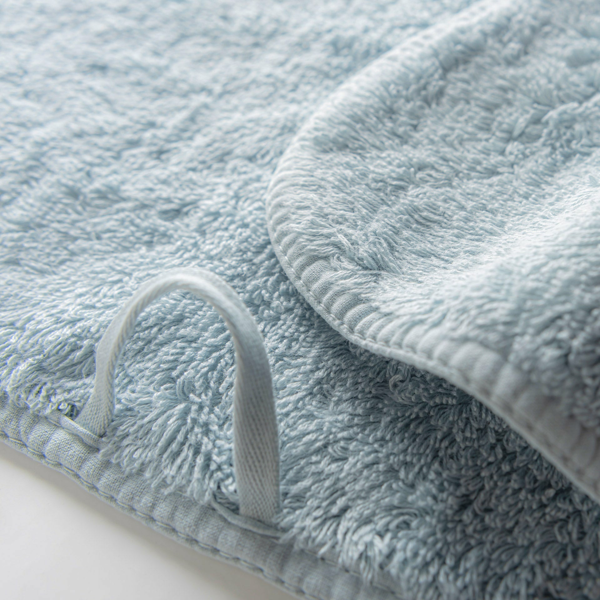 https://flandb.com/cdn/shop/products/Graccioza-Long-Double-Loop-Bath-Towels-Closeup-Sea-Mist_5000x.jpg?v=1660862703