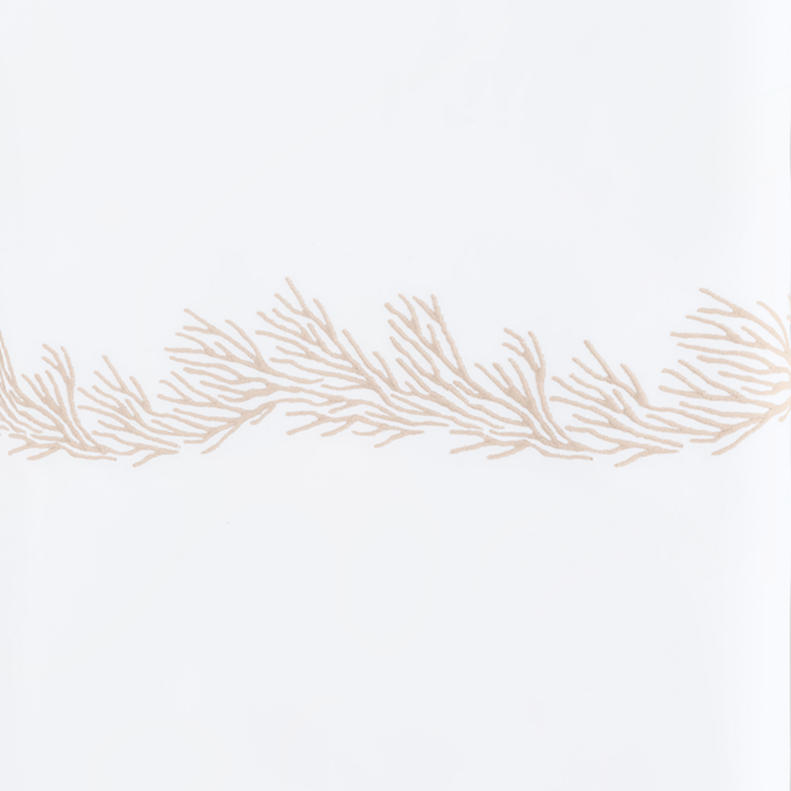 Full Lifestyle Image of Matouk Atoll Bedding Collection with Swatch of Dune