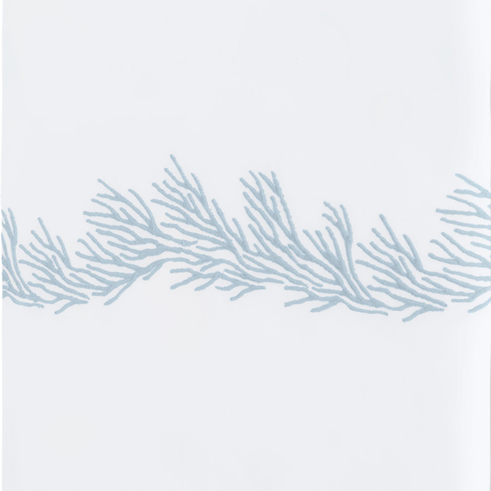 Full Lifestyle Image of Matouk Atoll Bedding Collection with Swatch of Wedgewood