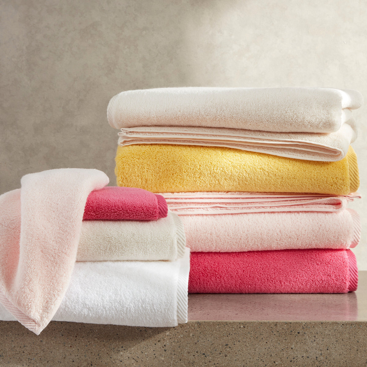 Matouk Milagro Bath Towels Yellow Pink Stack