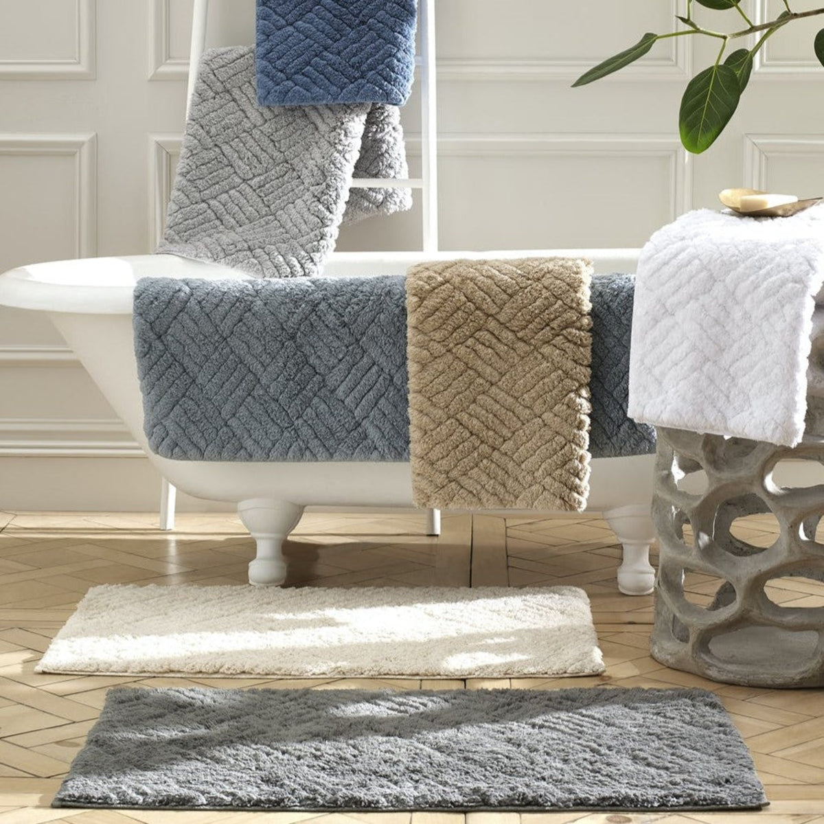 Different Colors of Matouk Cairo Bath Rugs in Lifestyle