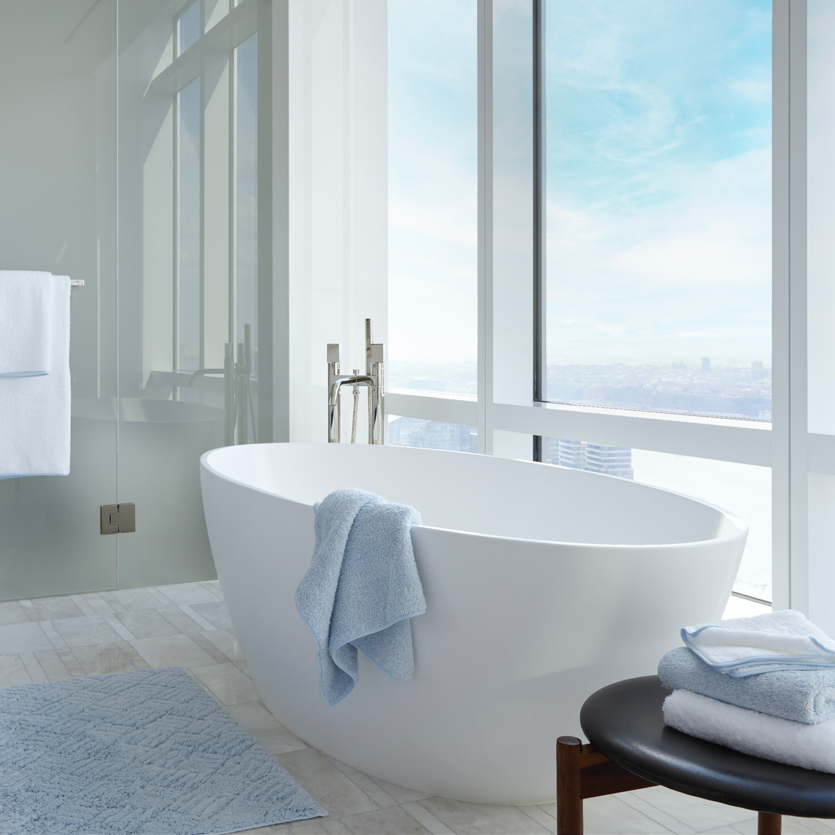 Luxury Bath Adorned with Matouk Cairo Bath in Light Blue Color