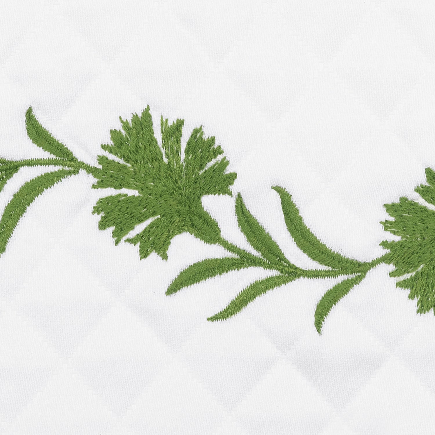 A side view of Matouk Daphne Matelasse Bedding