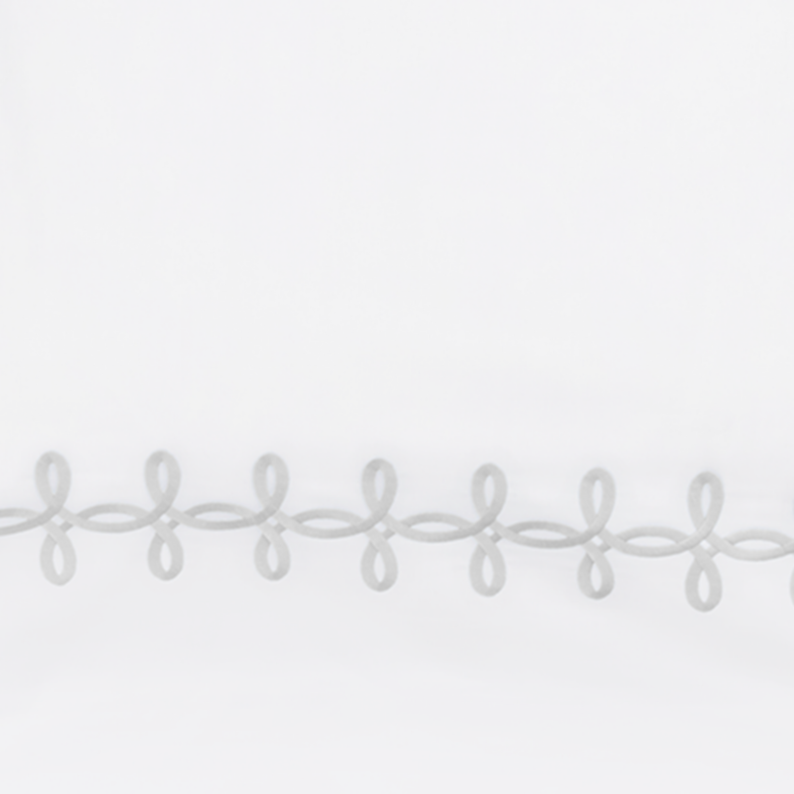 Stack of Matouk Gordian Knot Bedding with Different Colors