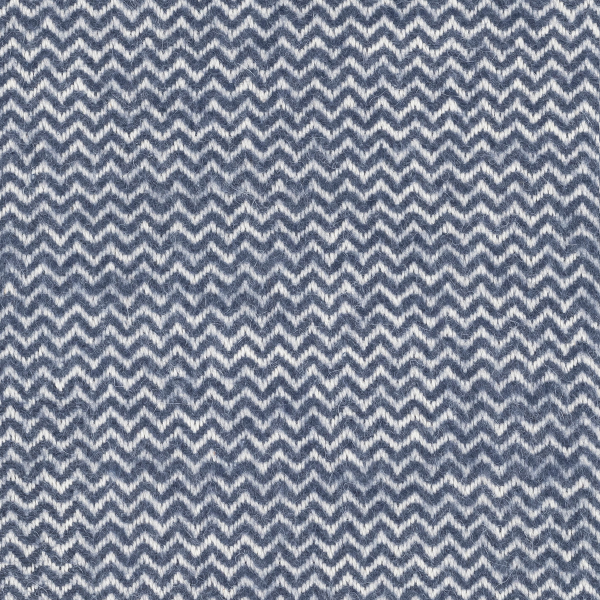 Square cut fabric of Folded Matouk Rhodes Throws Dusty Prussian Blue colored