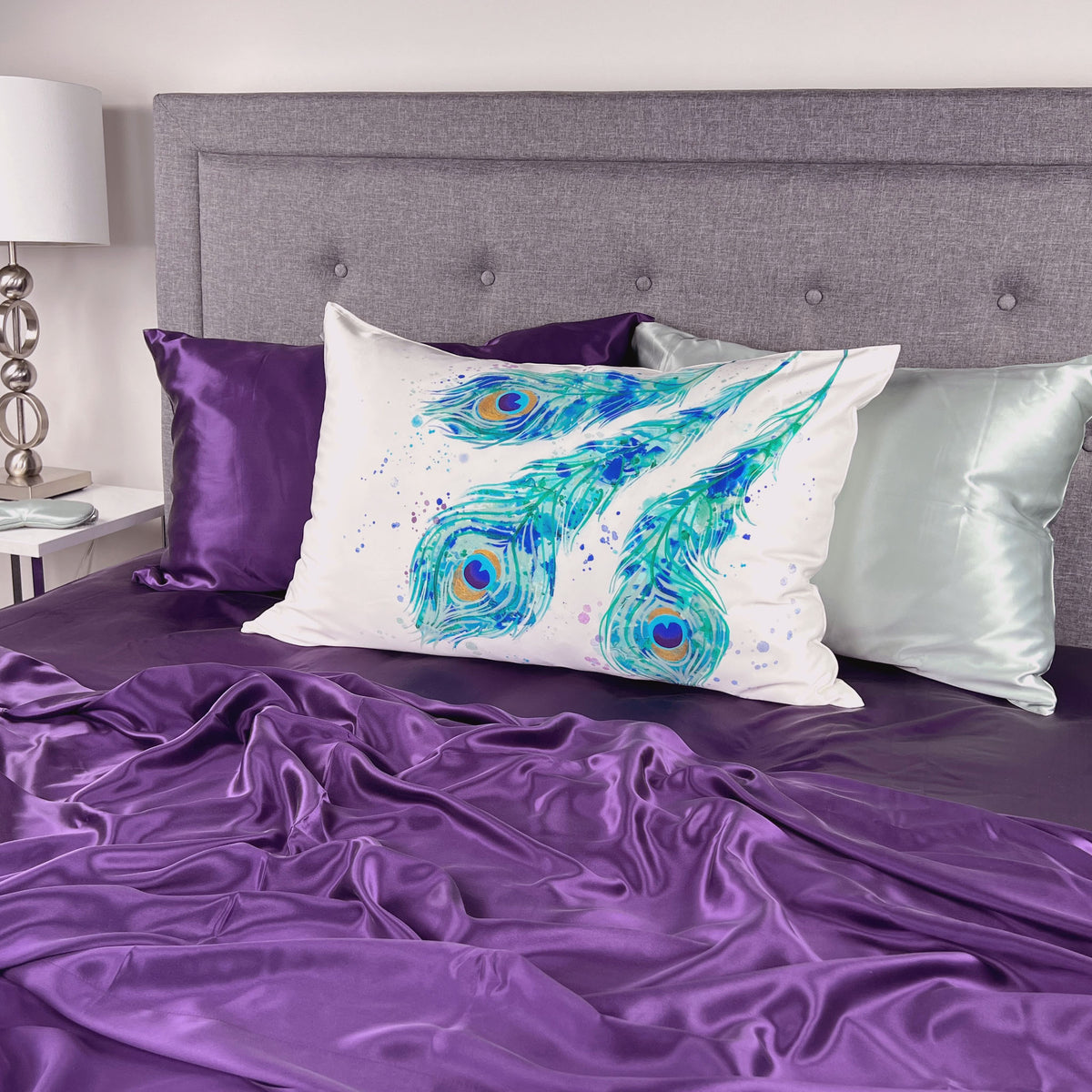 Mulberry Park Silks Peacock Feathers Silk Pillowcase on bed