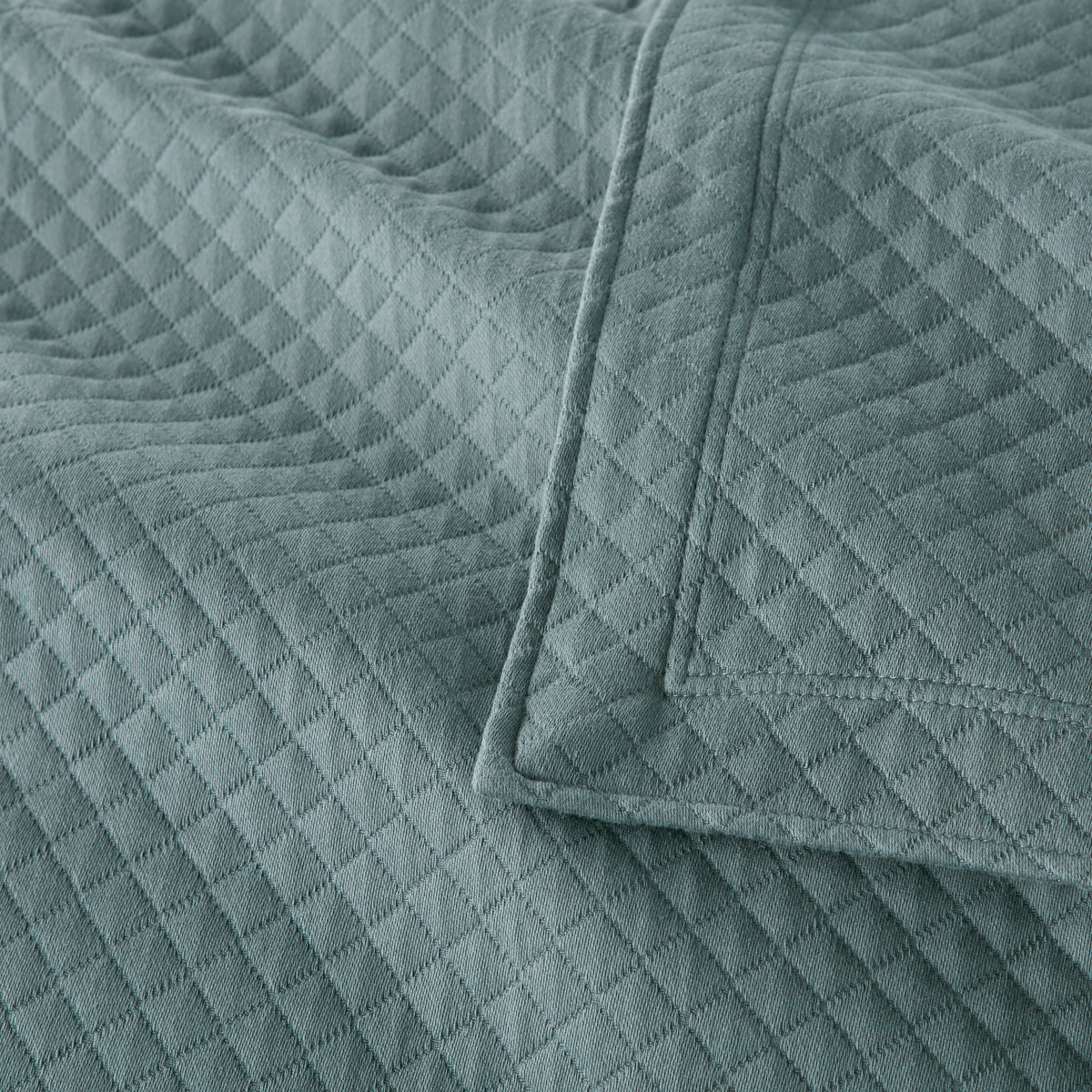 Fabric Closeup of Peacock Alley Oxford Matelassé Coverlets &amp; Shams Spruce