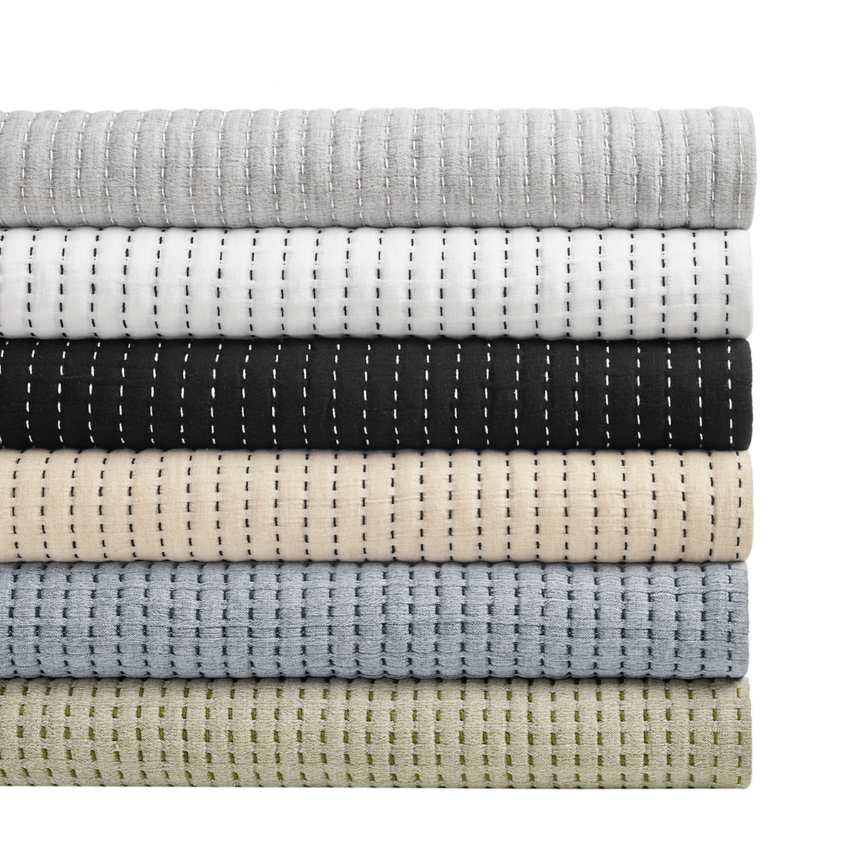 Stack of All Colors of Pine Cone Hill Pick Stitch Matelassé Coverlets