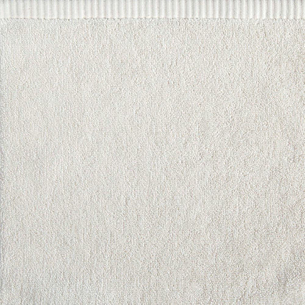 Stack of Home Treasures Riviera Bath Towels in Ivory Color