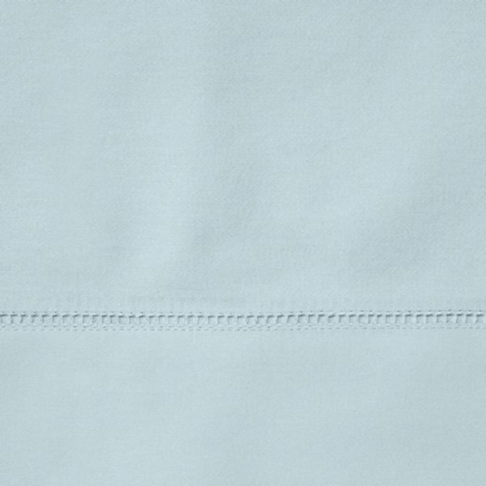 Full Lifestyle Image of Sferra Fiona Bedding with Swatch of Poolside