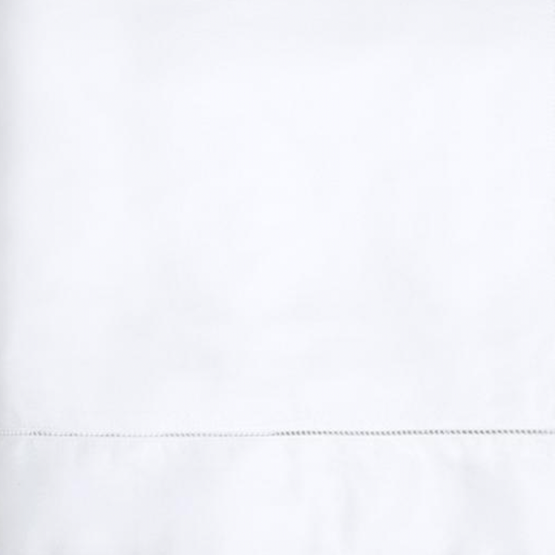 Full Lifestyle Image of Sferra Fiona Bedding with Swatch of White