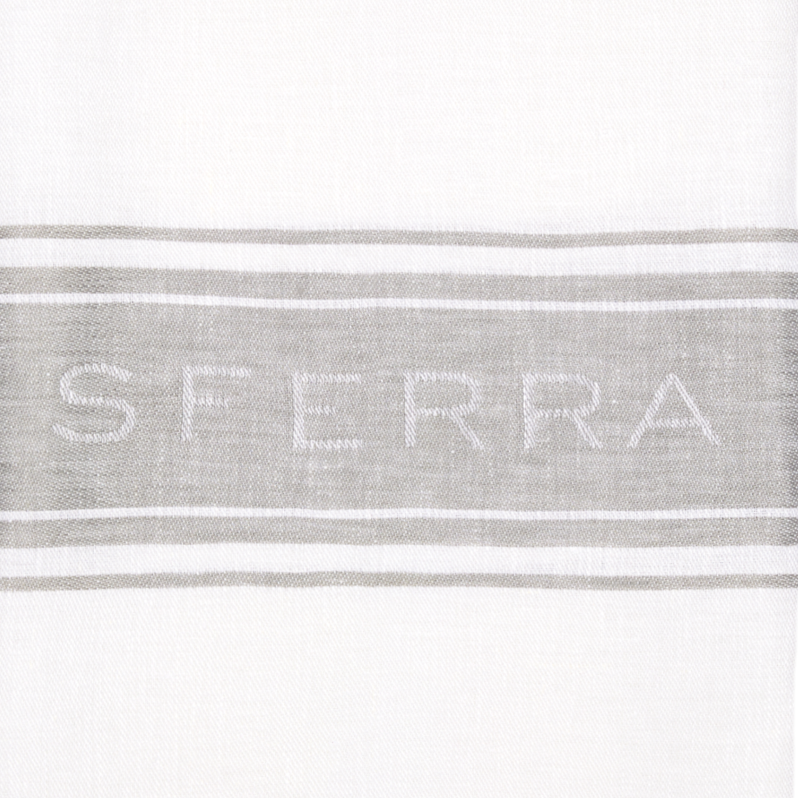 Sferra Kitchen towel wrapped around a loaf of bread