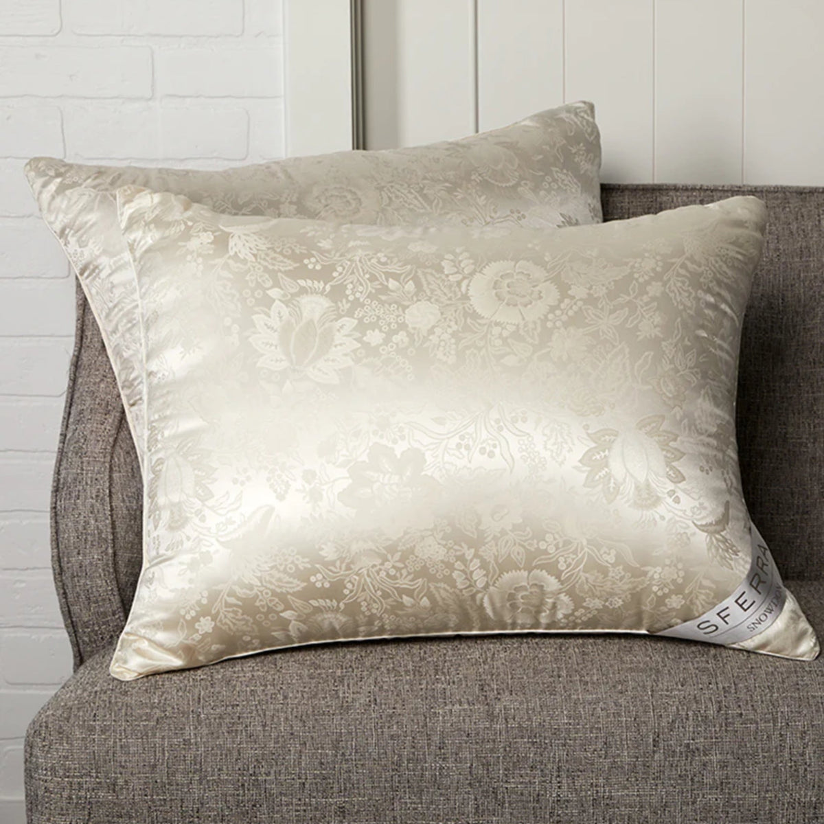Two Sferra Snowdon Pillow Lifestyle Photo on a Couch