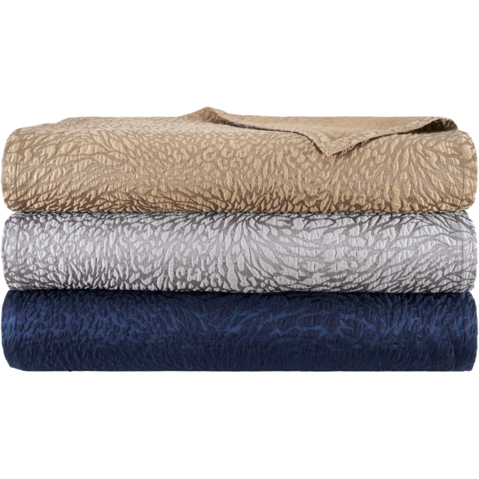 Stack of Yves Delorme Souvenir Cotton/Silk Coverlet in Different Colors