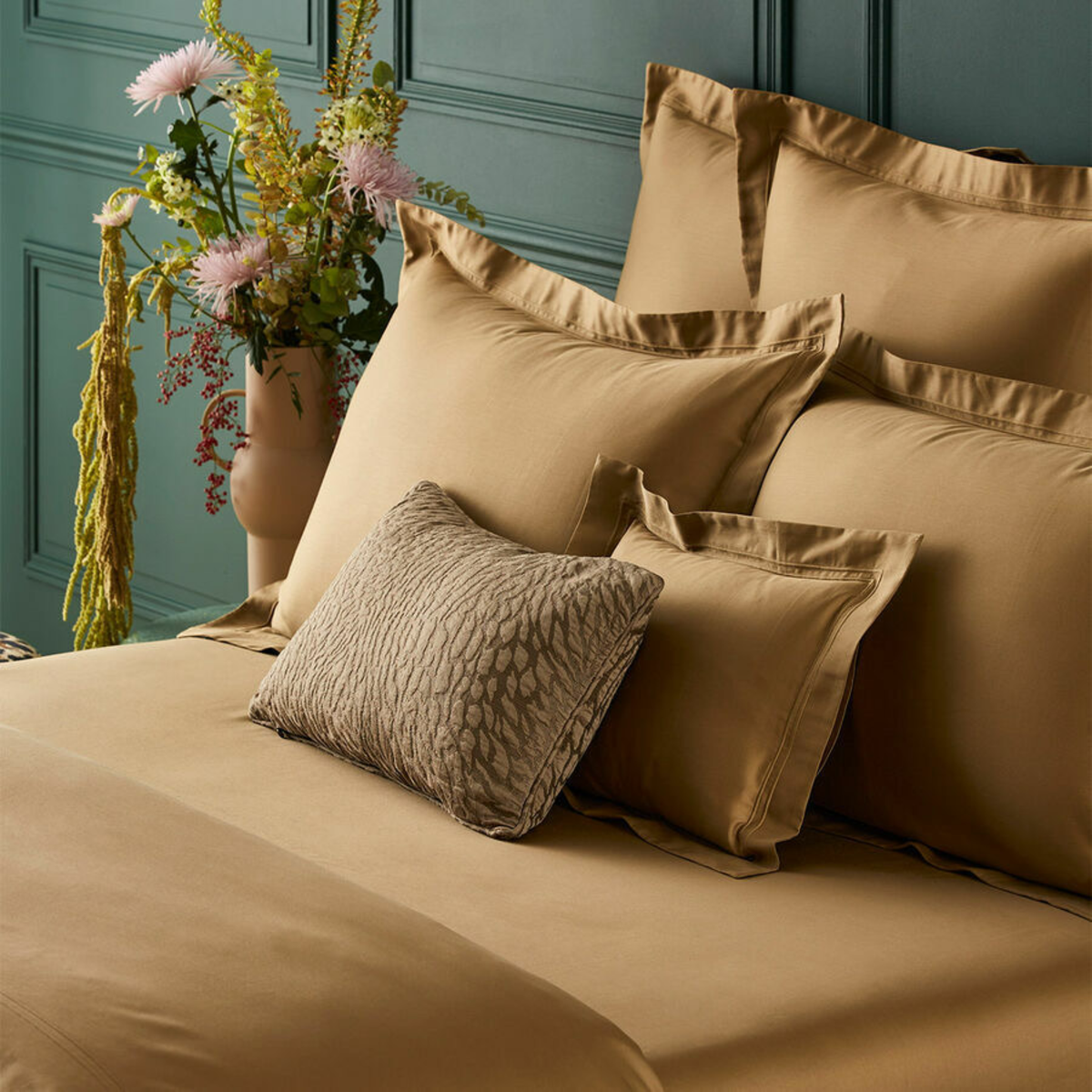 Shams and Pillows of Yves Delorme Triomphe Bedding in Bronze Color