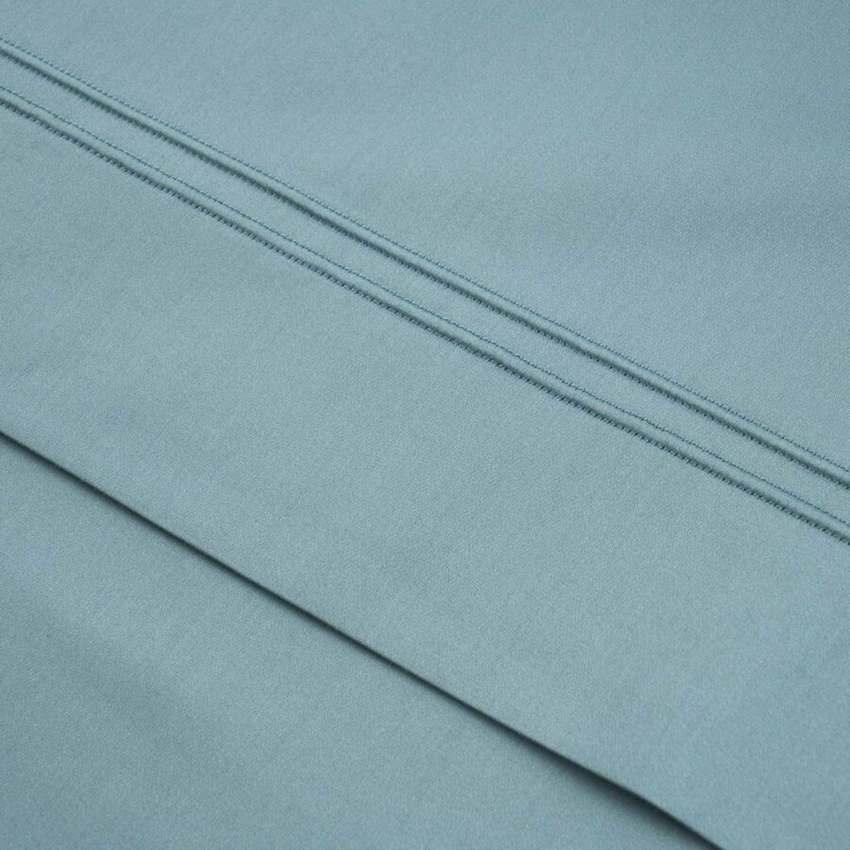 Closeup of Fabric of Yves Delorme Triomphe Sheet Sets in Fjord Color