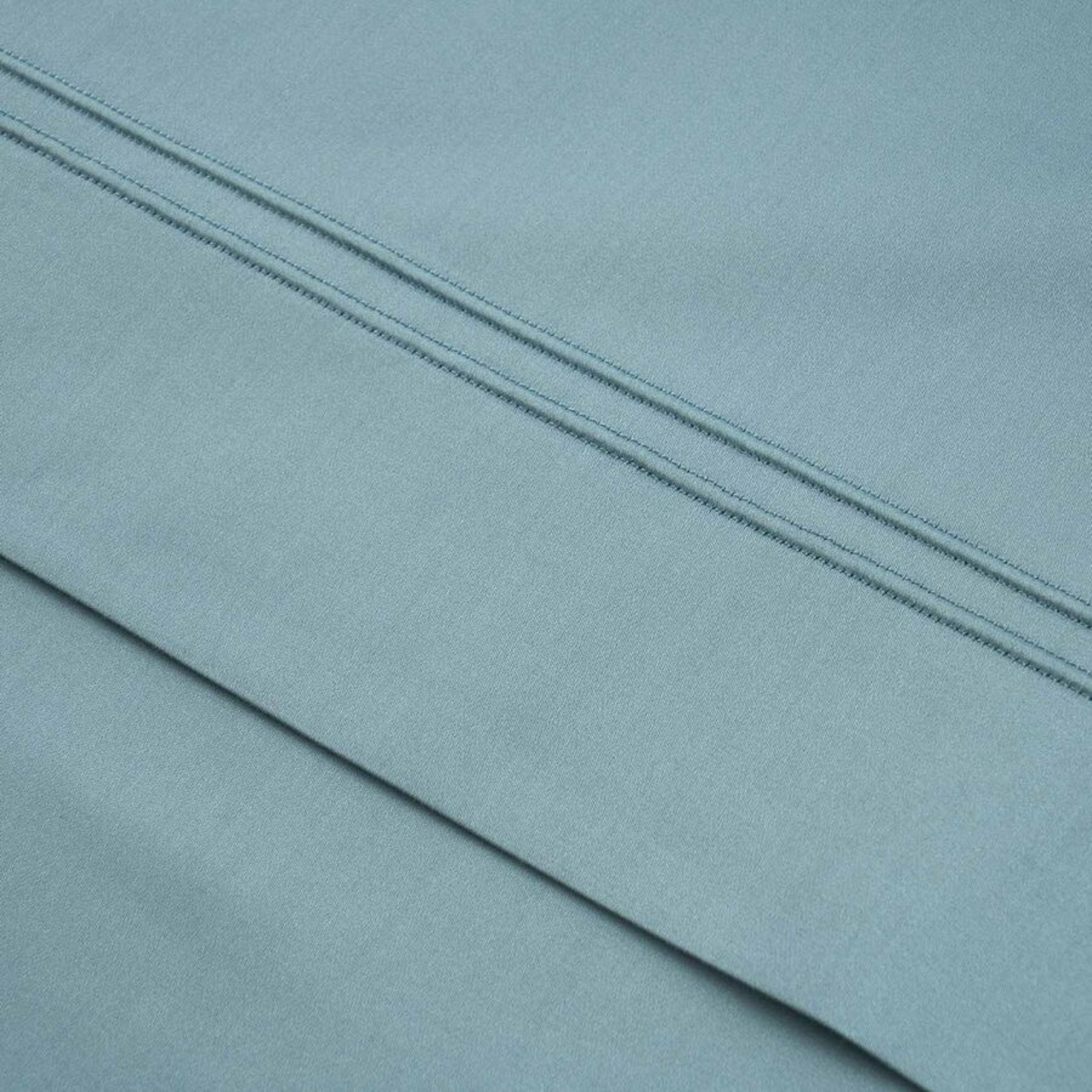 Sheet Set Stack of Yves Delorme Triomphe Sheet Sets in Fjord Color