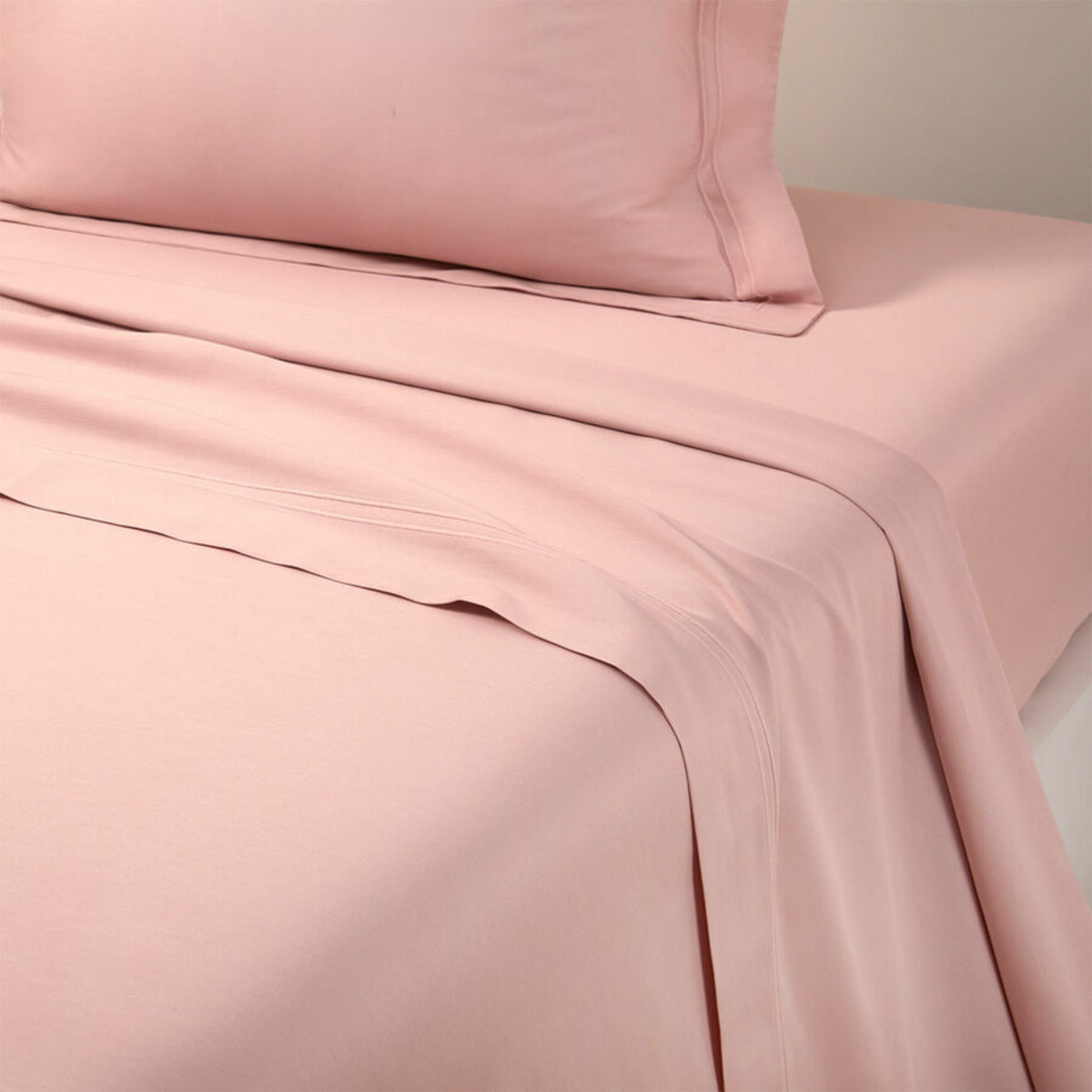 Closeup of Flat Sheet Yves Delorme Triomphe Bedding in Poudre Color