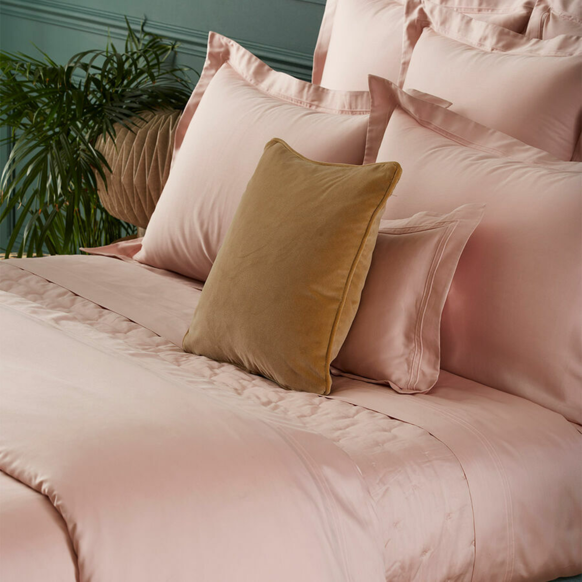 Shams and Pillows of Yves Delorme Triomphe Bedding in Poudre Color