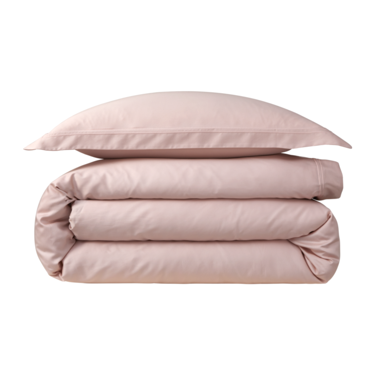 Stack of Pillow and Sheets of Yves Delorme Triomphe Bedding in Poudre Color